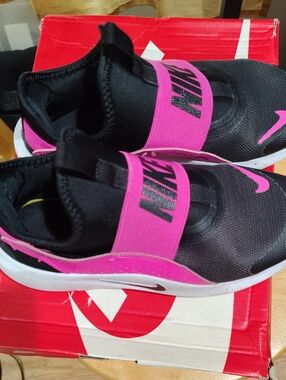 Nike Kids Slip-On Sneakers in Black and Hot Pink